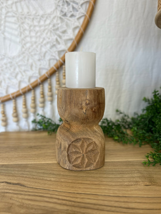 Carved wooden candle holder